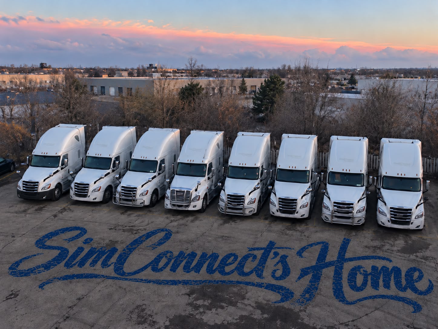 SimConnect trucks lined up at sunset, with SimConnect’s Home painted in blue on the ground